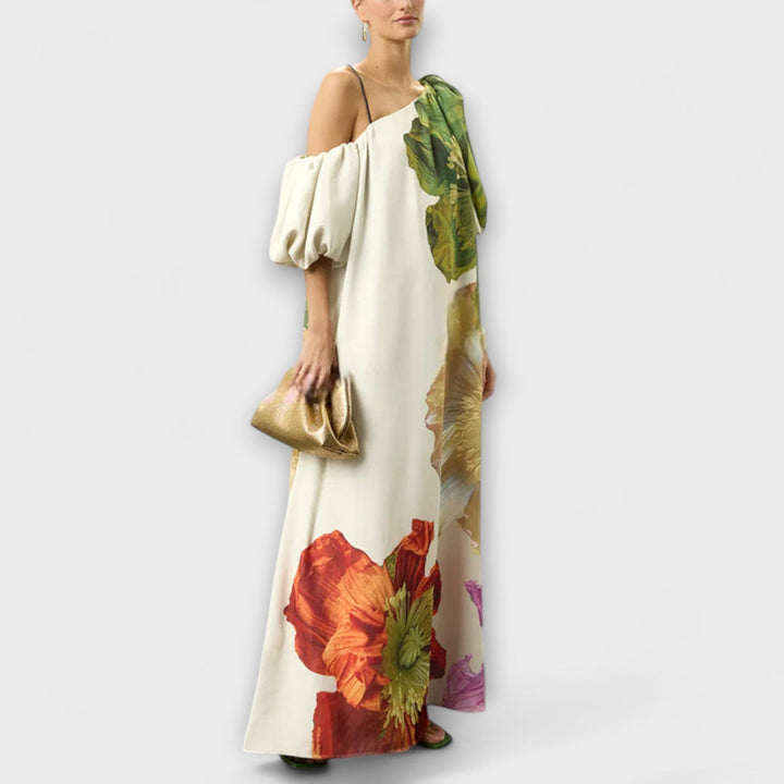 Skylar - Maxi robe à imprimé floral, décolleté asymétrique et manches bouffantes