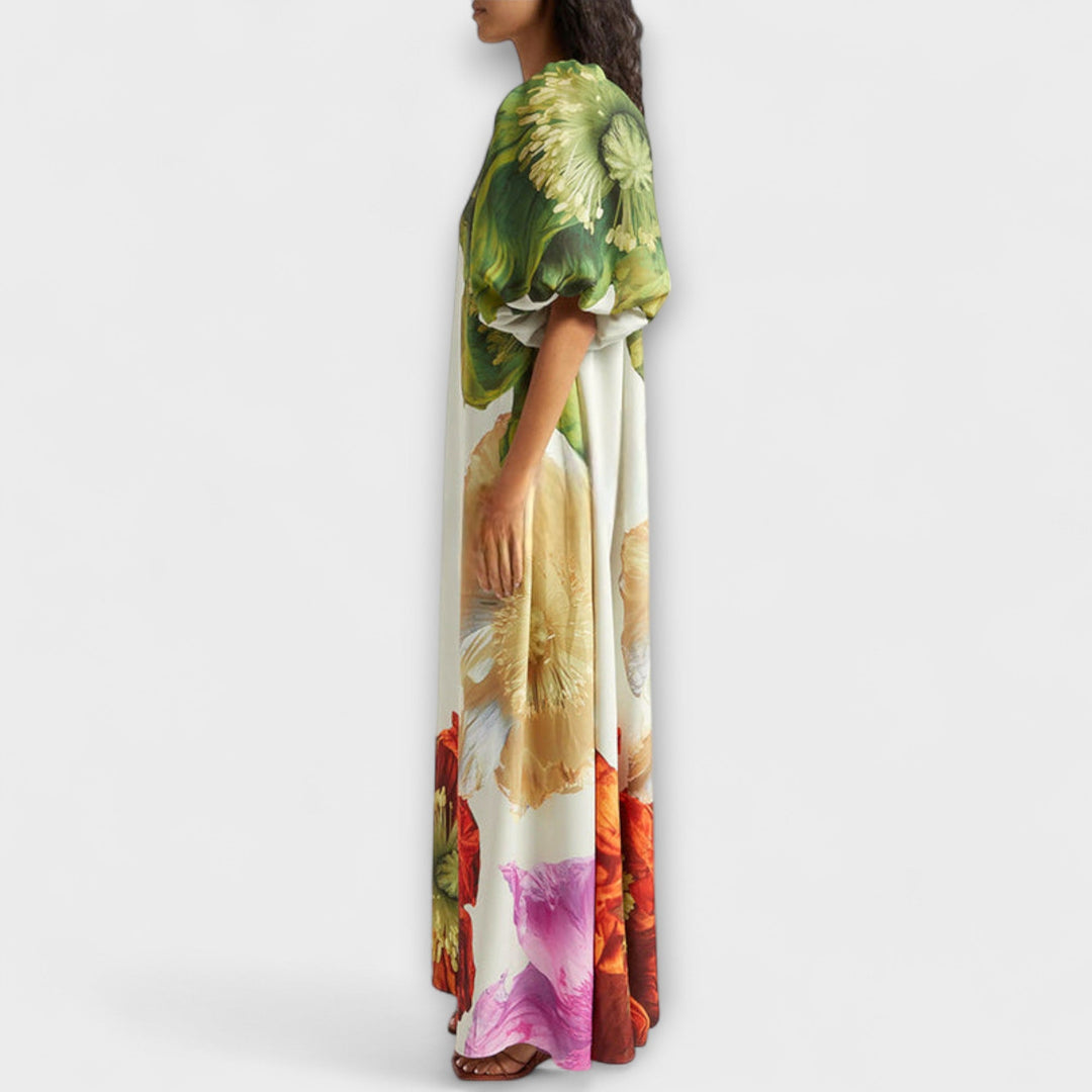 Skylar - Maxi robe à imprimé floral, décolleté asymétrique et manches bouffantes